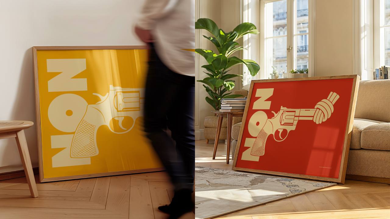 Non-Violence art print of The Knotted Gun in red and yellow background framed in wood displayed in a living room.
